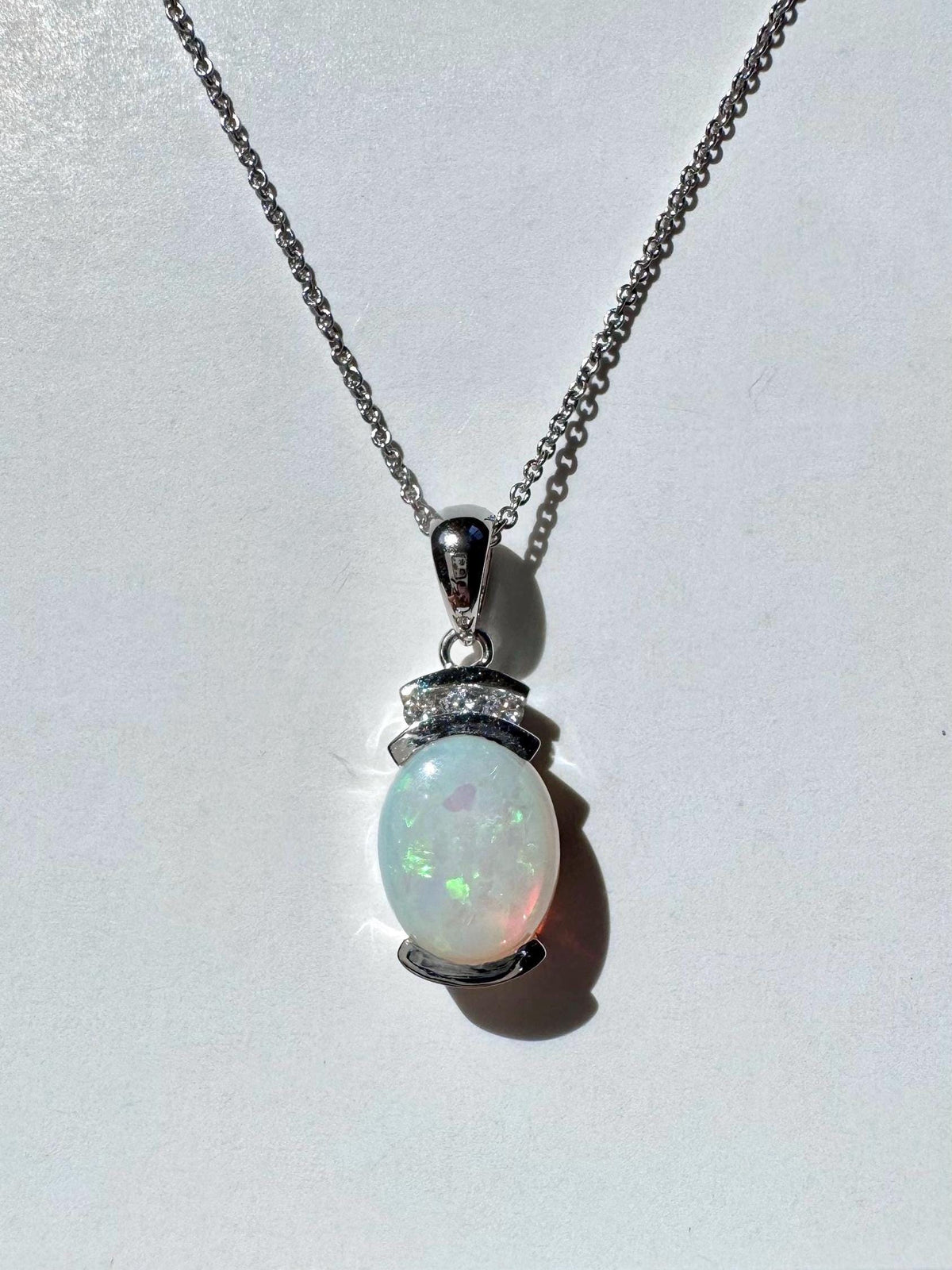 Genuine Oval Cut Opal and Diamond Pendant in 14k Solid Gold