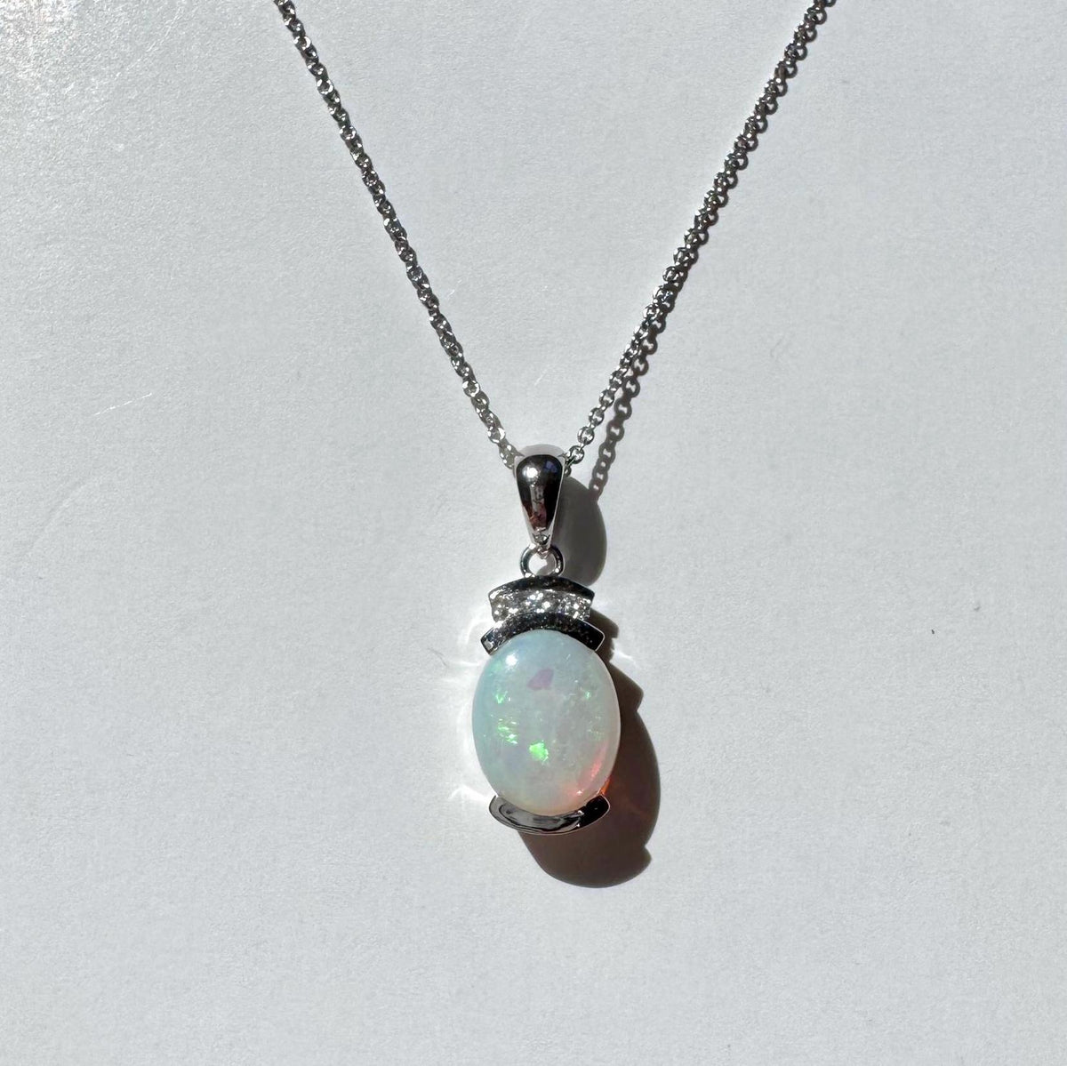 Genuine Oval Cut Opal and Diamond Pendant in 14k Solid Gold