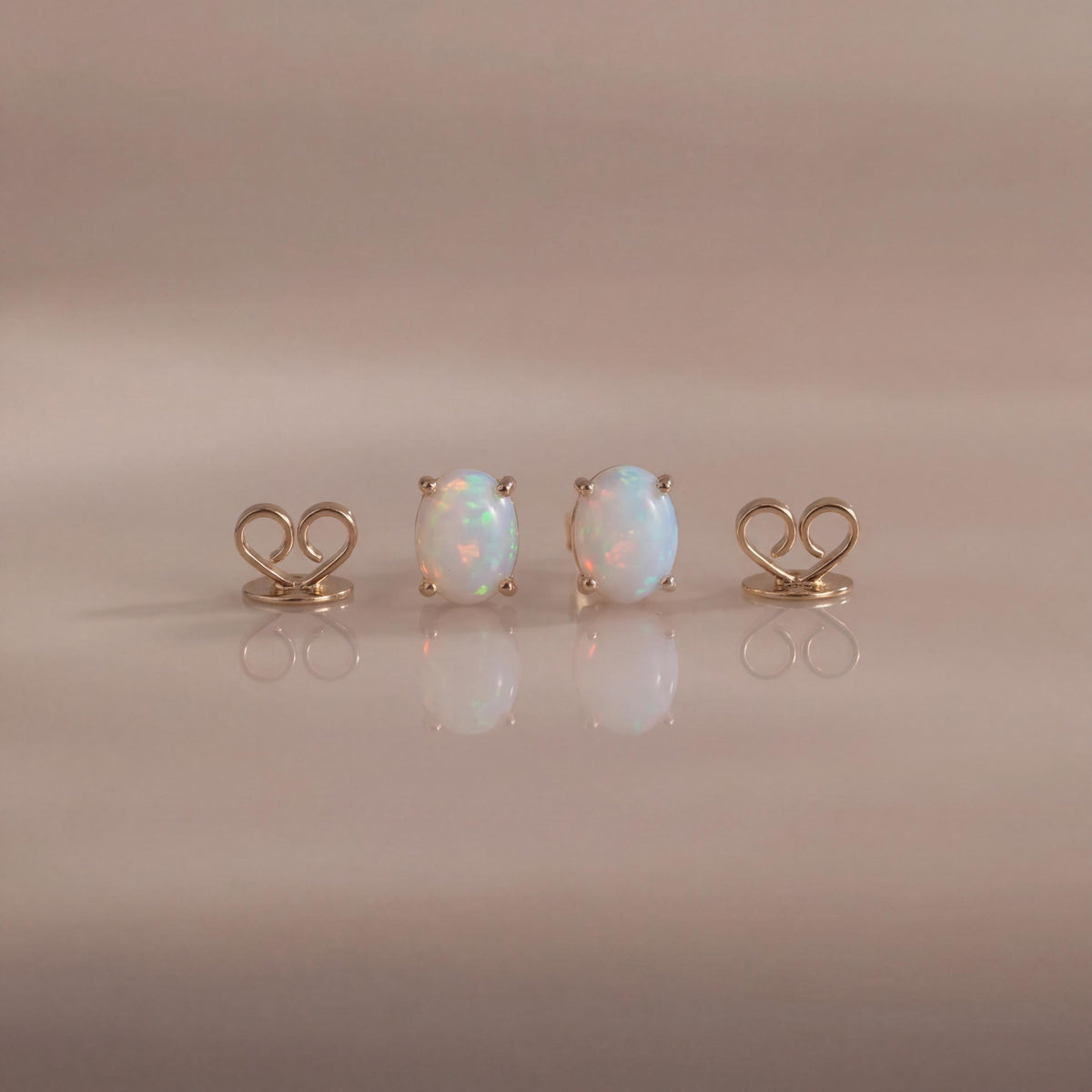 Genuine Opal Oval Cut Solitaire Stud Earrings in 14k Solid Gold
