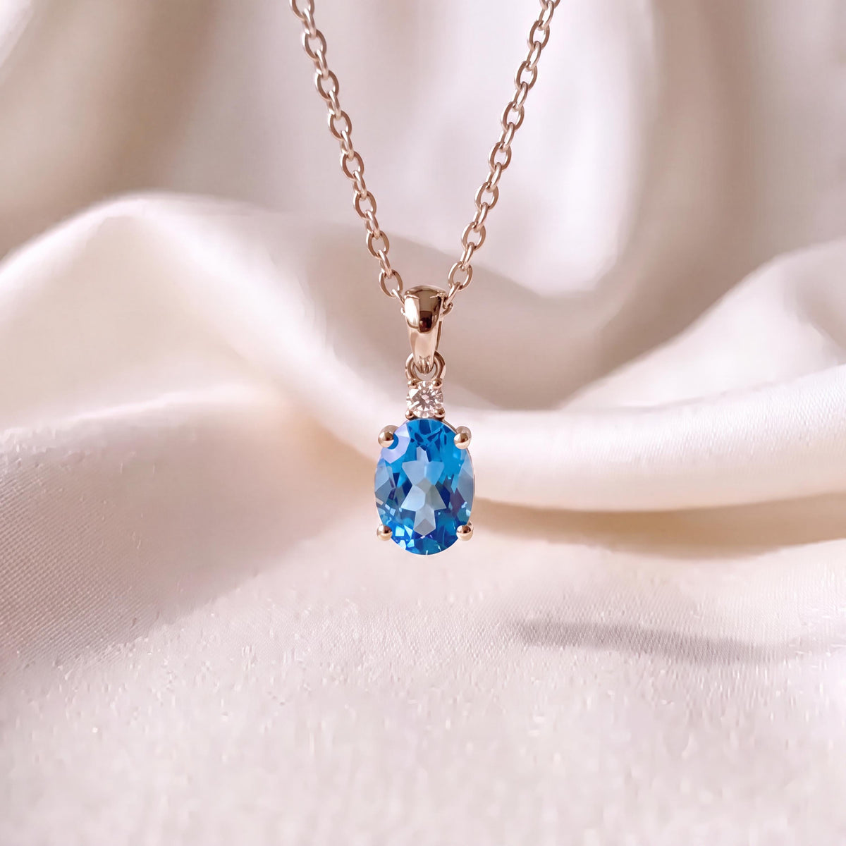 Genuine Blue Topaz and Diamond Oval Cut Pendant / 14k Solid Gold