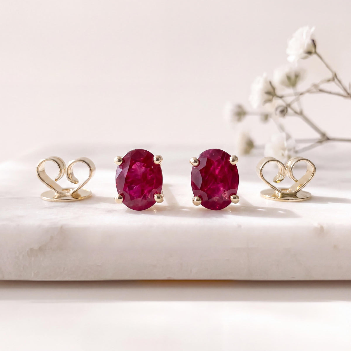 Genuine Ruby Oval Cut Stud Earrings in 14k Solid Gold