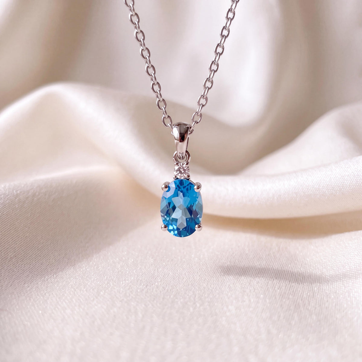 Genuine Blue Topaz and Diamond Oval Cut Pendant / 14k Solid Gold